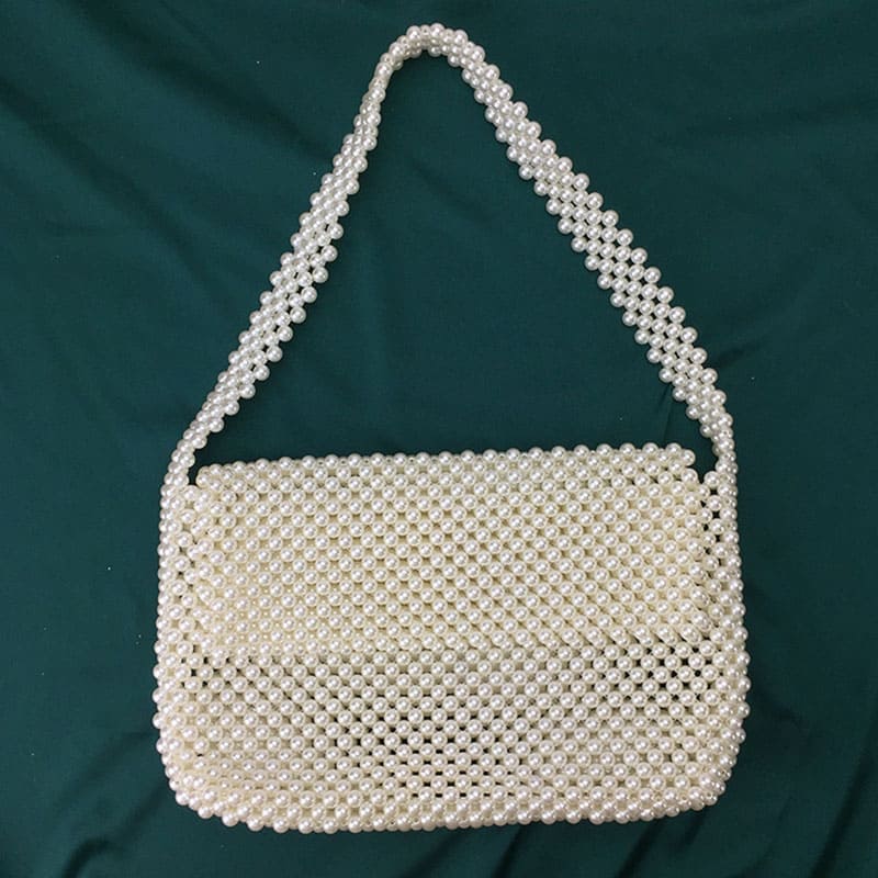 Artisan Pearl Clutch - Unique and Timeless