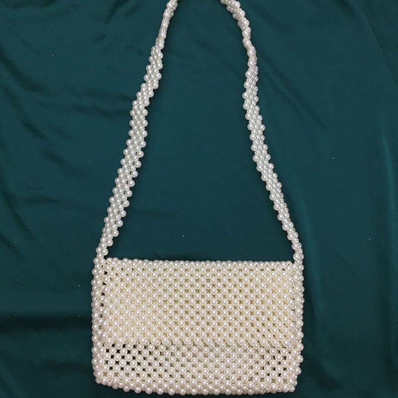 Artisan Pearl Clutch - Unique and Timeless