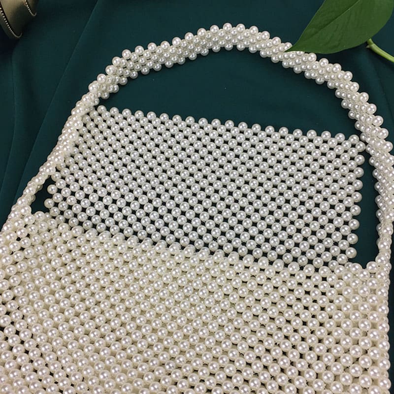 Artisan Pearl Clutch - Unique and Timeless